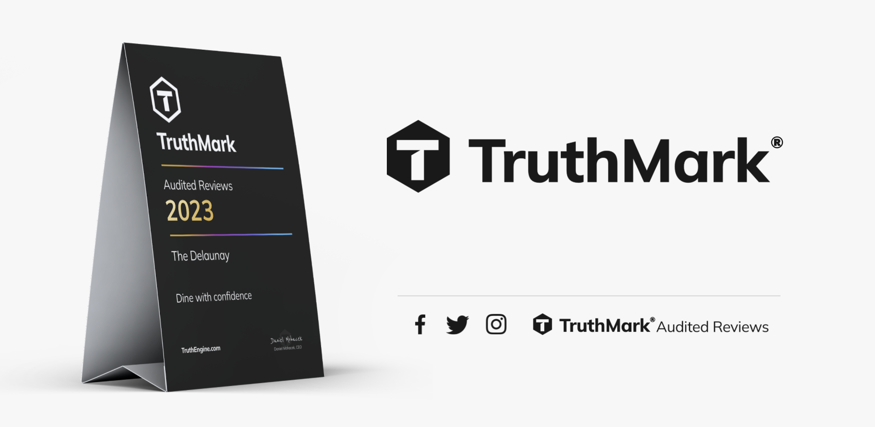 The Truthmark logo on a board, with social icons